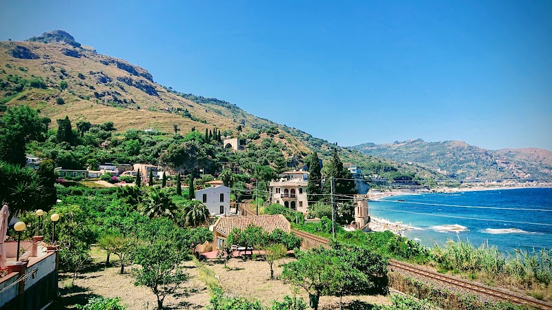 Baia delle Sirene in Giardini, Italy